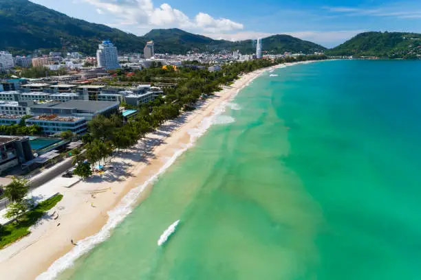 Patong beach Phuket Thailand in September 16- 2021 Amazing beach beautiful sea in andaman sea Aerial view Drone camera High angle view.