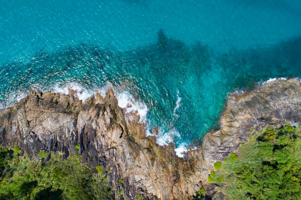 istock Aerial view Top down seashore wave crashing on seashore Beautiful turquoise sea surface in sunny day Good weather day summer background Amazing seascape top view 1341184274