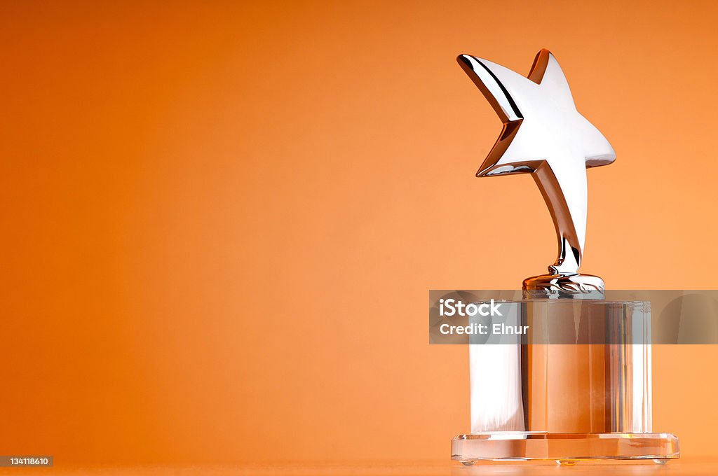 Star award contra Fundo de Inclinação - Foto de stock de Formato de Estrela royalty-free