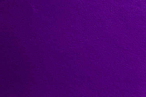 Indigo color old grunge wall concrete texture as background.