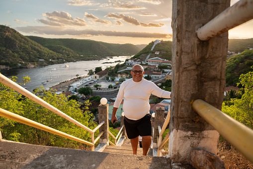 Tourist shows aerial view of Piranhas in Alagoas at sunset