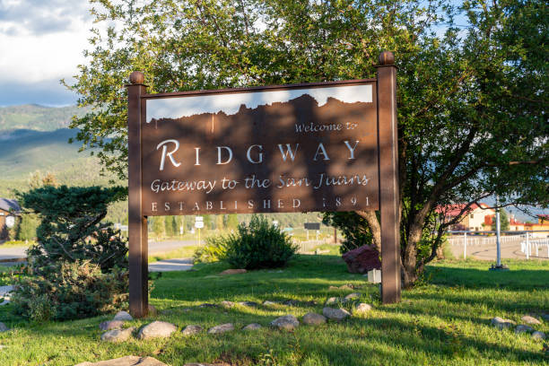 Sign for Welcome to Ridgway gateway to the San Juans mountains Ridgway, Colorado - August 3, 2021: Sign for Welcome to Ridgway gateway to the San Juans mountains ridgway stock pictures, royalty-free photos & images