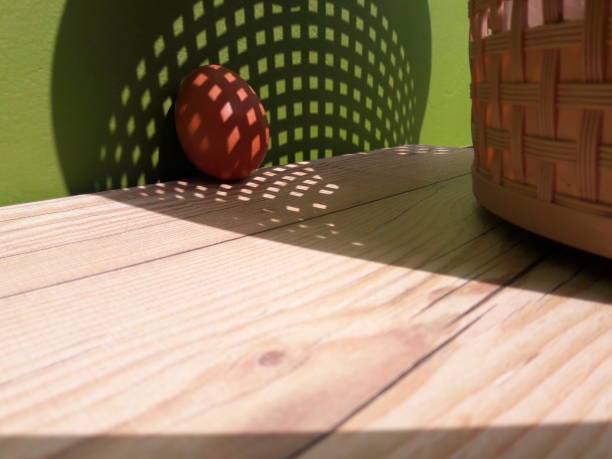 photo of eggs and basket shadow on table - winter farm vibrant color shadow imagens e fotografias de stock