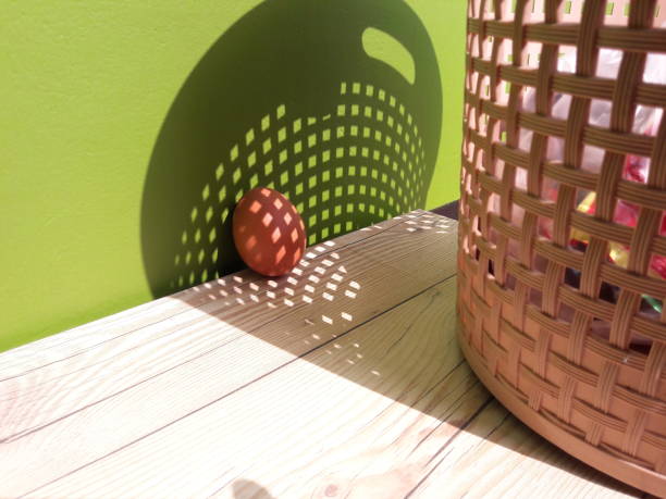 photo of eggs and basket shadow on table - winter farm vibrant color shadow imagens e fotografias de stock