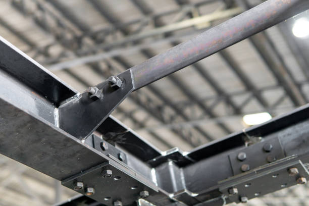 istock Connect joint plate and lock bolt of steel structure in construction work in factory 1341193708