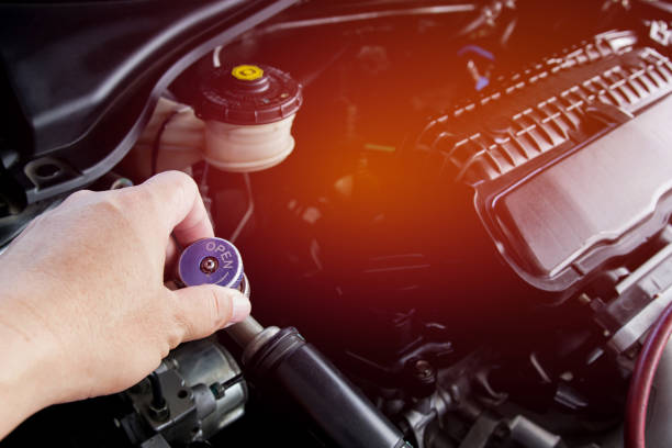 Close up and Technician setting plug of Air refill kit for car repair air  condition maintenance concept in car repair shop Close up and Technician setting plug of Air refill kit for car repair air  condition maintenance concept in car repair shop Furnace stock pictures, royalty-free photos & images