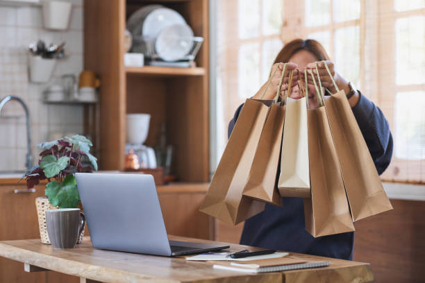 istock A female entrepreneur using laptop computer for selling or shopping online 1341198121