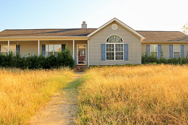 Unkempt Property of Foreclosed Working Class Ranch Style Home stock photo