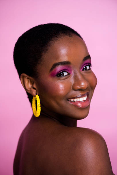 istock Young teenager with glossy make up looking over her shoulder 1341209327