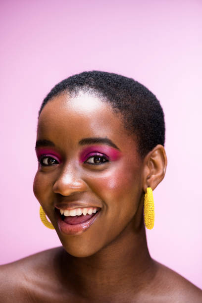 istock Young energetic woman smiling with mouth open to camera 1341209405