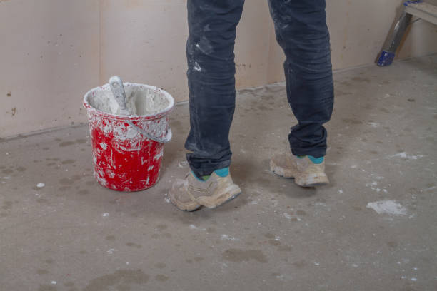 istock Bucket with putty and spatula for wall putty 1341214462