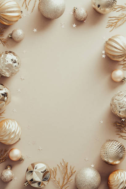 istock Frame with modern Christmas decorations on beige background. Elegant Christmas vertical banner design, New Year poster mockup. 1341227221