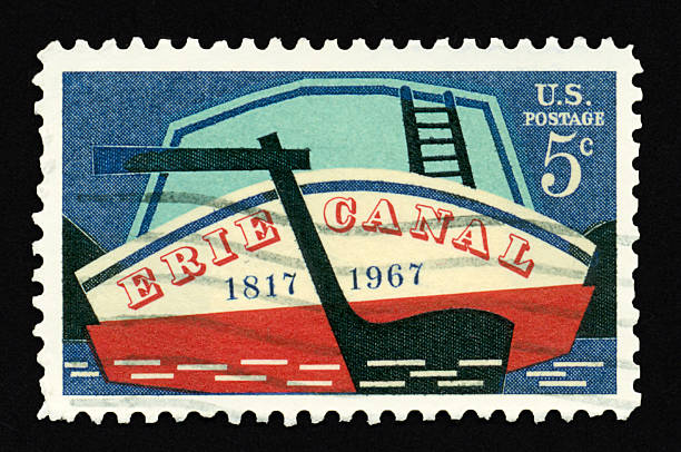 Five Cent Erie Canal Stamp The 5-cent postage stamp commemorating the 50th anniversary of the opening of the Erie Canal was released in 1967. erie canal stock pictures, royalty-free photos & images