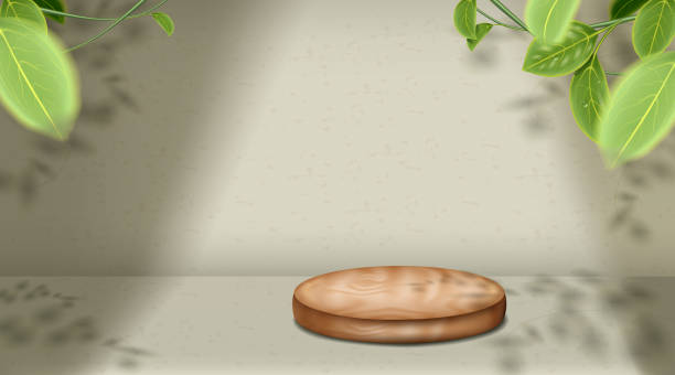 istock Product podium in green background with shadow of leaves on a wall. 1341232258