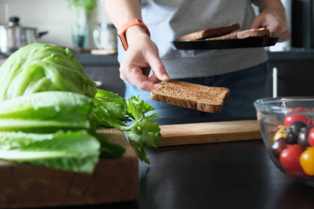 istock Making vegan sandwiches at home 1341234572