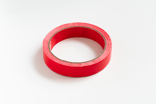 Adhesive Red Tape Isolated on White
