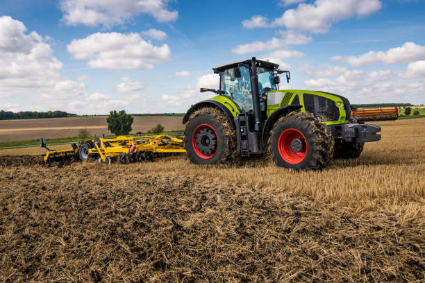 istock tractor with disc harrow, soil cultivation system in operation 1341237073
