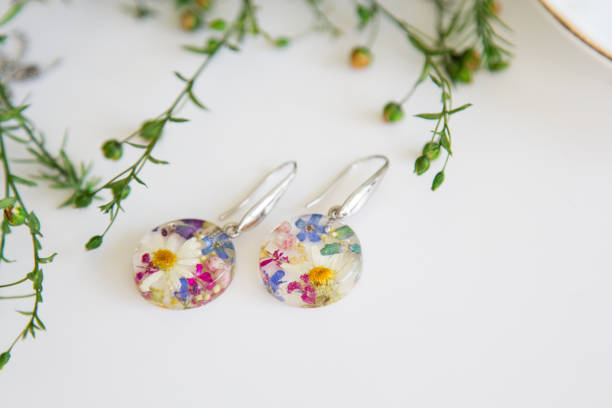 istock Real flowers in epoxy resin, jewelry 1341239067