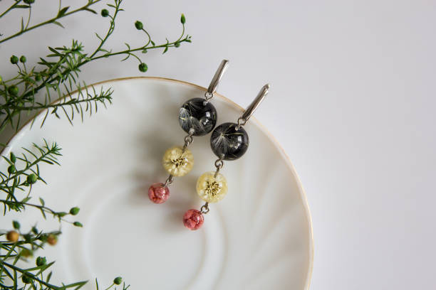 istock Real flowers in epoxy resin, jewelry 1341239358