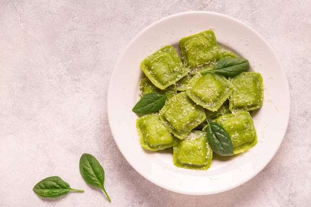 Ravioli with spinach and parmesan, top view stock photo