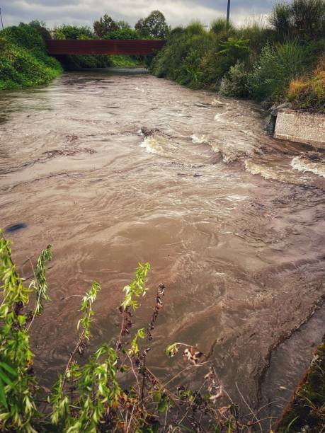 istock flooding of a river during a thunderstorm 1341241623