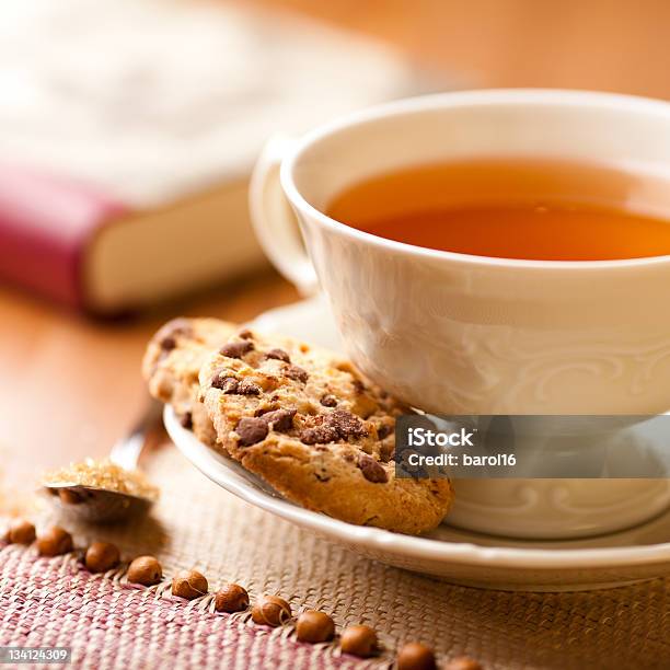 Cup Of Tea And Chocolate Chip Cookies Stock Photo - Download Image Now - Tea - Hot Drink, Antioxidant, Book