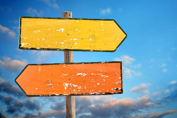 istock Blank two way old wooden directional sign 1341244606
