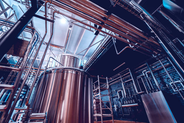 istock Craft beer brewing equipment in privat brewery 1341246874
