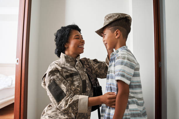 istock Mother and her son looking at each other and smiling while having fun 1341247214