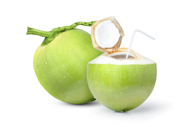 istock green coconuts and coconut water isolated on white background. 1341250128