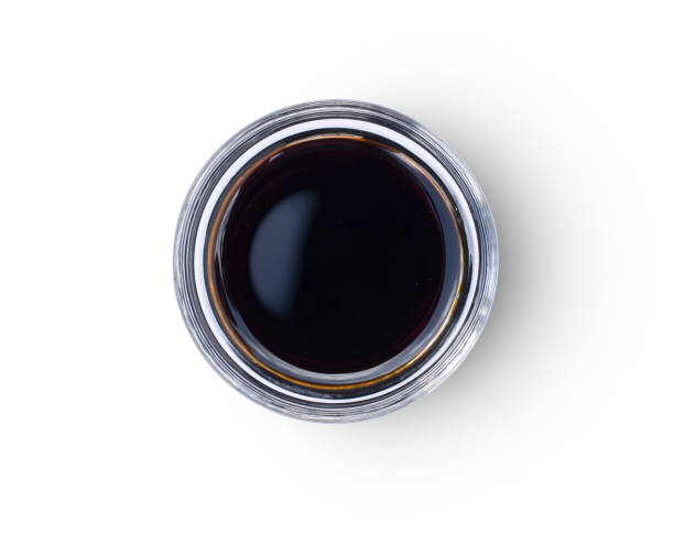 soy sauce white background Dish of soy sauce isolated on white background with clipping path. Top view. Flat lay. soy sauce photos stock pictures, royalty-free photos & images