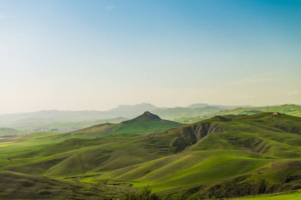 A view of the rolling green hill in the region of Enna.