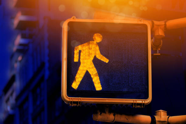 Close up traffic stop light for pedestrians in New York street Close up traffic stop light for pedestrians at night in New York street pedestrian stock pictures, royalty-free photos & images