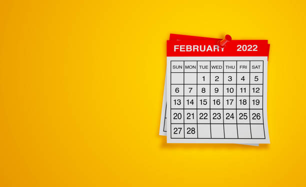 istock February 2022 calendar on yellow background 1341256242