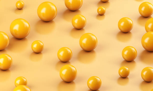 istock Yellow spheres on a yellow background 1341256273