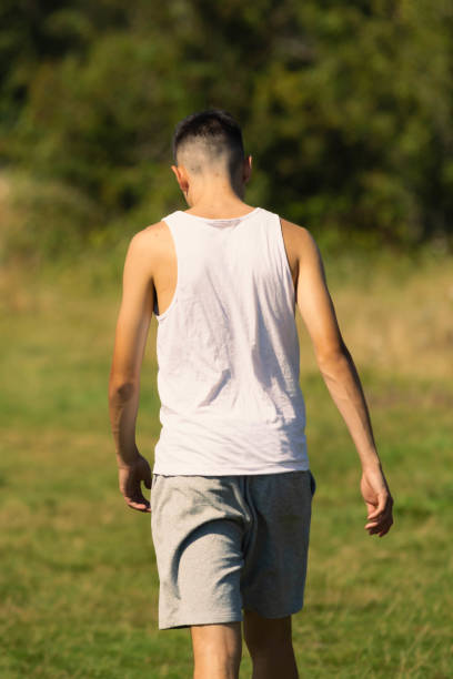 istock 18 year old in a sleeveless top 1341256655