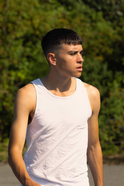 istock 18 year old in a sleeveless top 1341257603