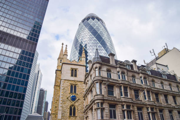 The Gherkin building, City of London London, United Kingdom - September 3 2021: 30 St Mary Axe aka The Gherkin, City of London. london docklands stock pictures, royalty-free photos & images