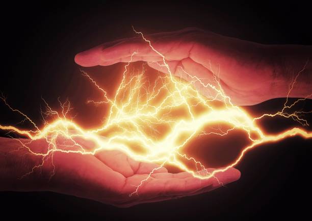 istock Generate electricity between hands with the concept of science technology 1341257788