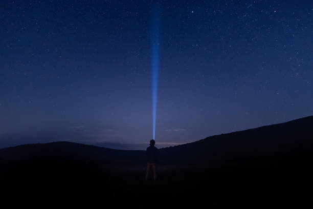istock The starry sky at night on the grassland 1341260231