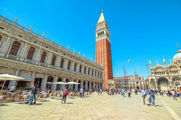 glockenturm san marco der stadt venedig - italy bell tower built structure building exterior stock-fotos und bilder