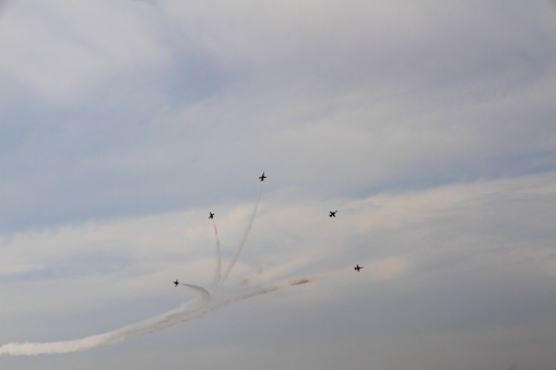 IZMIR, TURKEY - SEPTEMBER 09 : Turkish Stars, the aerobatic demonstration team of the Turkish Air Forces, perform within the 96th Independence day of Izmir, Turkey on September 09, 2021
