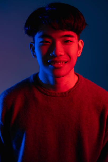istock neon light portrait modern illumination man red 1341266381