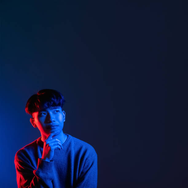 istock uncertain man advertising background neon light 1341266387
