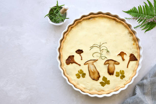 istock Homemade pie with wild mushrooms and curd cheese. Copy space. Top view. 1341267027