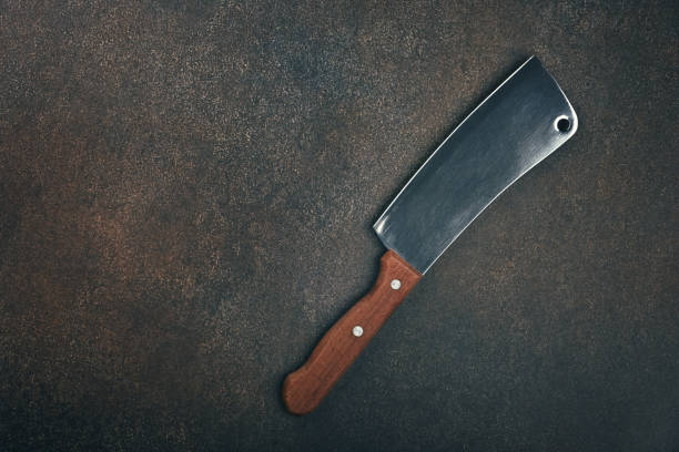 istock Meat cleaver with wooden handle on table 1341271343