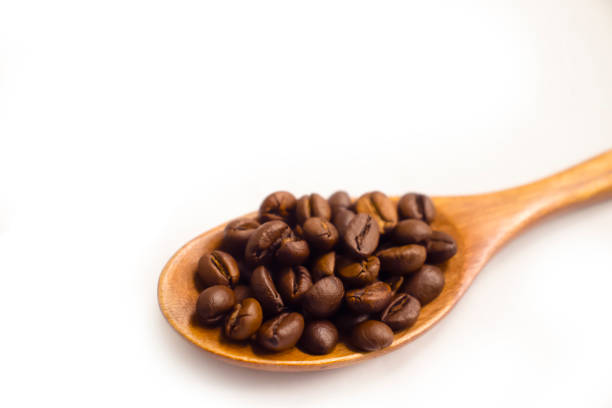 istock wooden spoon with coffee grains isolated 1341272413