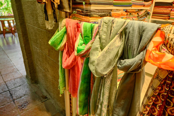Bracelets and stoles in a row in red fort market, Delhi, India.