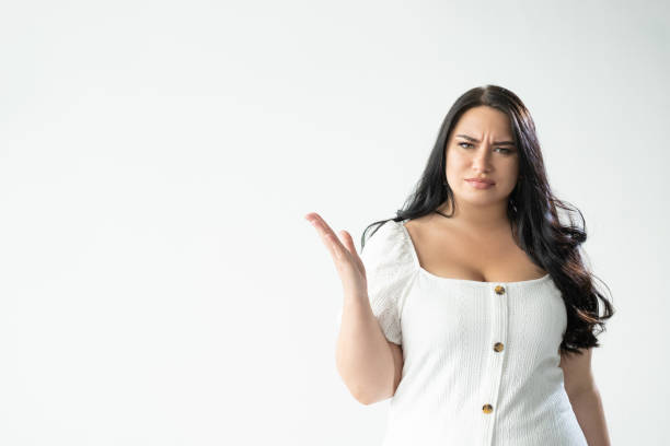 omg wtf annoyed woman what problem crazy situation Omg wtf. Annoyed woman. What problem. Crazy situation. Pissed-off gloomy plus size lady looking confused and angry shrugging hand isolated white copy space. wtf stock pictures, royalty-free photos & images