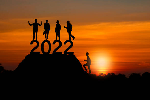 istock new year 2022 with business people silhouette 1341273933